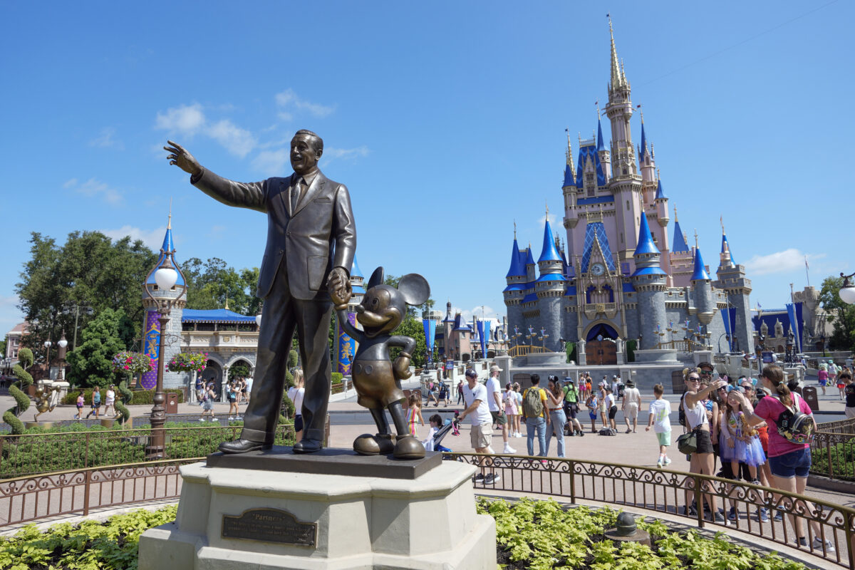 Group of disney shareholders demand info on kimmel suspension, accuse board of ‘improper’ political motivations - bnews Statue of walt disney and mickey mouse in front of cinderella castle at walt disney world in orlando, florida.