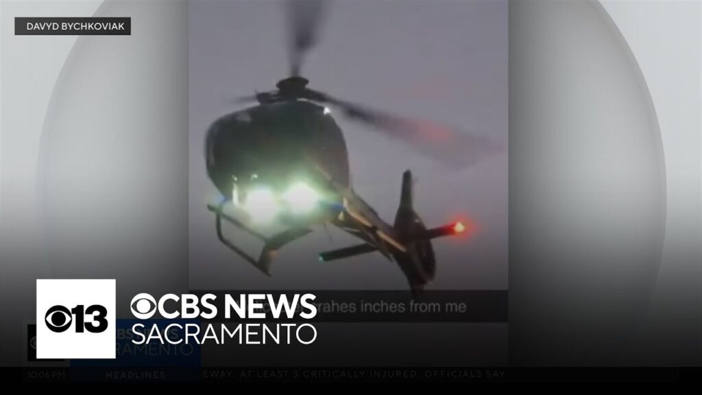 Driver captures horrifying moment medevac helicopter crash onto highway, just feet from his car