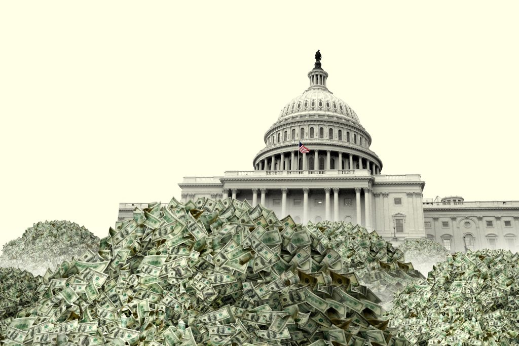 The U.S. Capitol building awash in piles of debt.