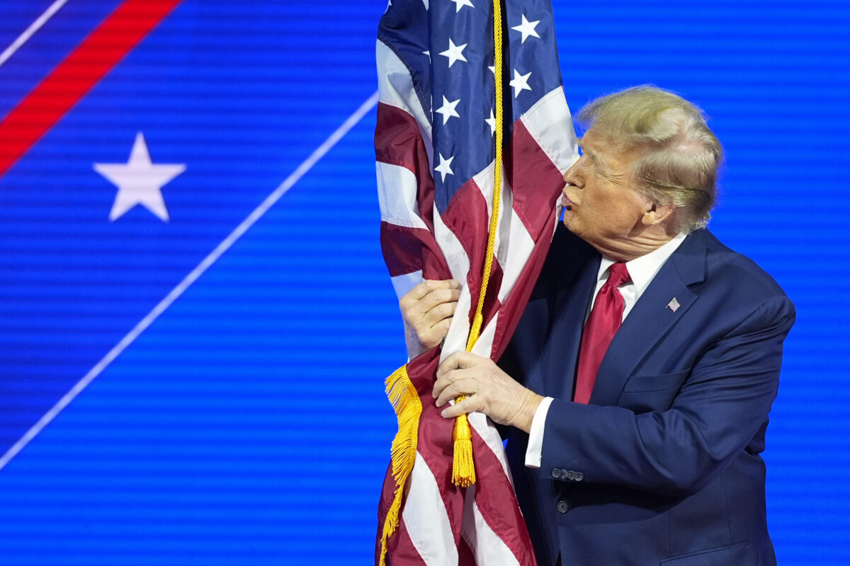 Trump being weird kissing flag