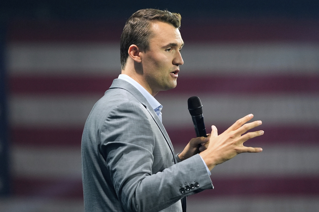 Charlie kirk with microphone