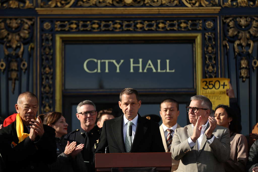 San Francisco Mayor Daniel Lurie looks on during a press conference regarding his new executive directive about street safety on steps of City Hall in San Francisco, on Monday, Dec. 15, 2025. 