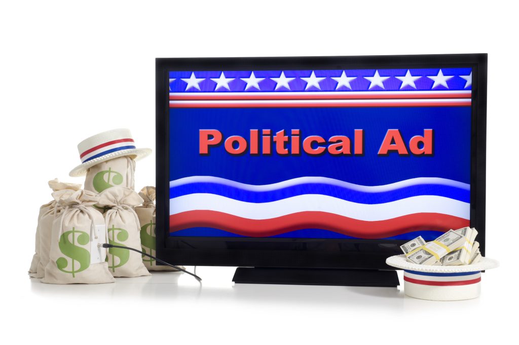 Screen showing "Political Ad" and surrounded by money