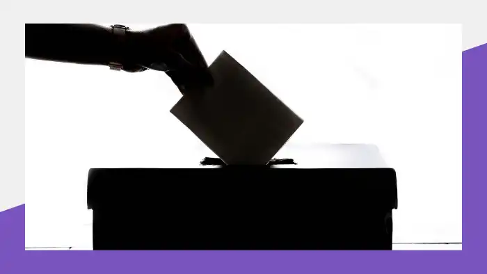 Covering the election? Keep these 7 tips handy this november 2026 | journalists and journalism 2026 world news from bulgaria - balgarianovinite. Com Person dropping a ballot into a box