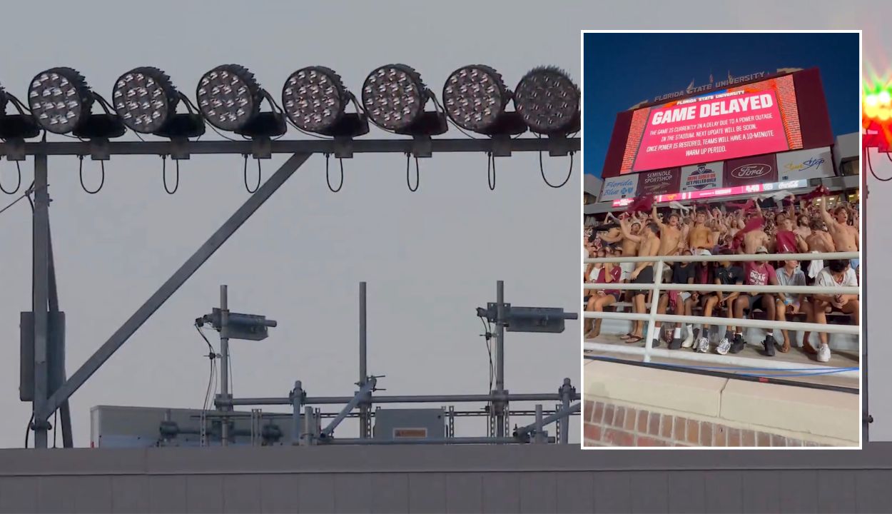 dark lights at doak campbell stadium and fans waving shirts like rally towels