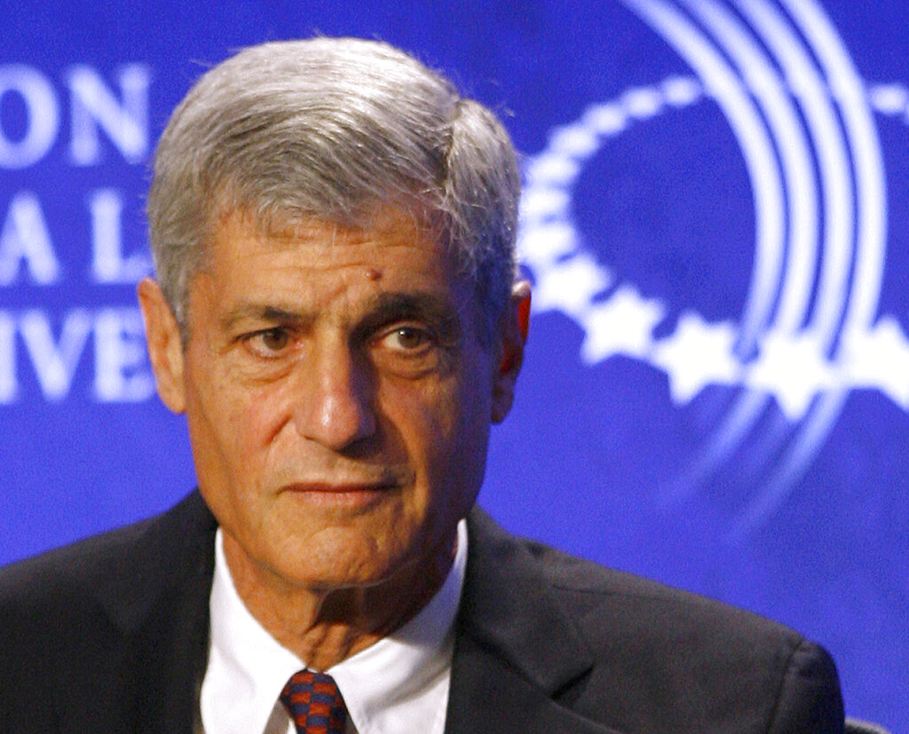 Robert rubin in 2007 file photo with a blue and white background